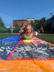 child using water slide